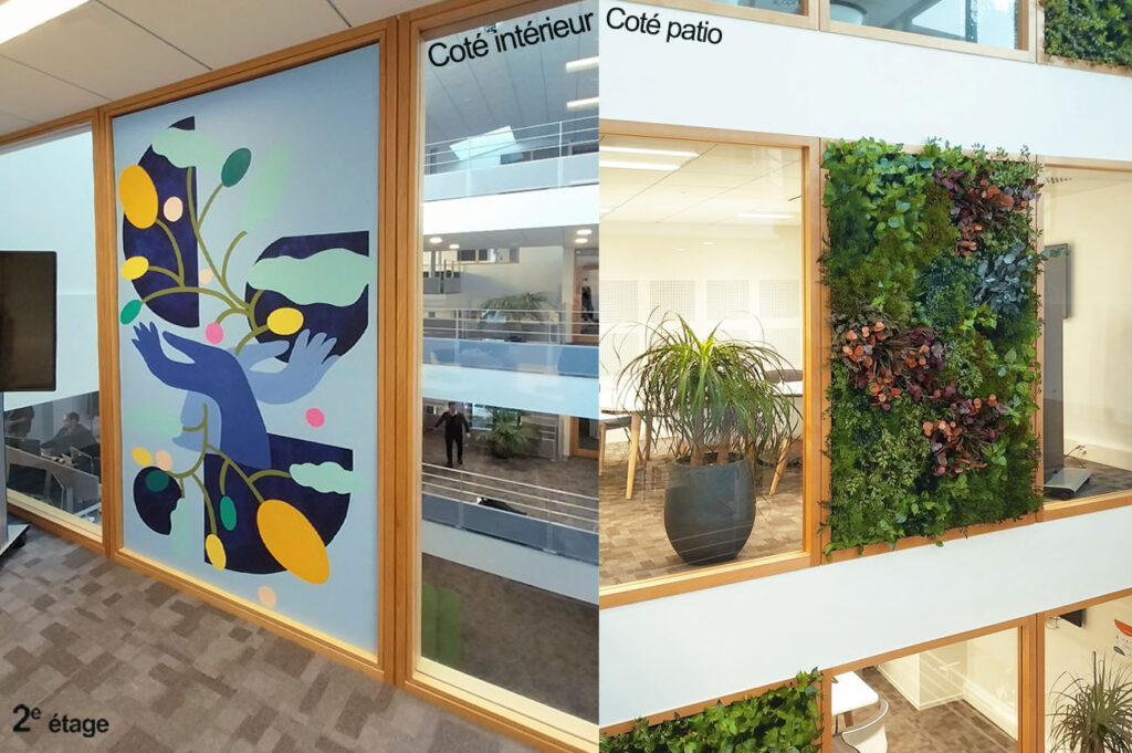 Salle de réunion avec peinture design et mur végétal